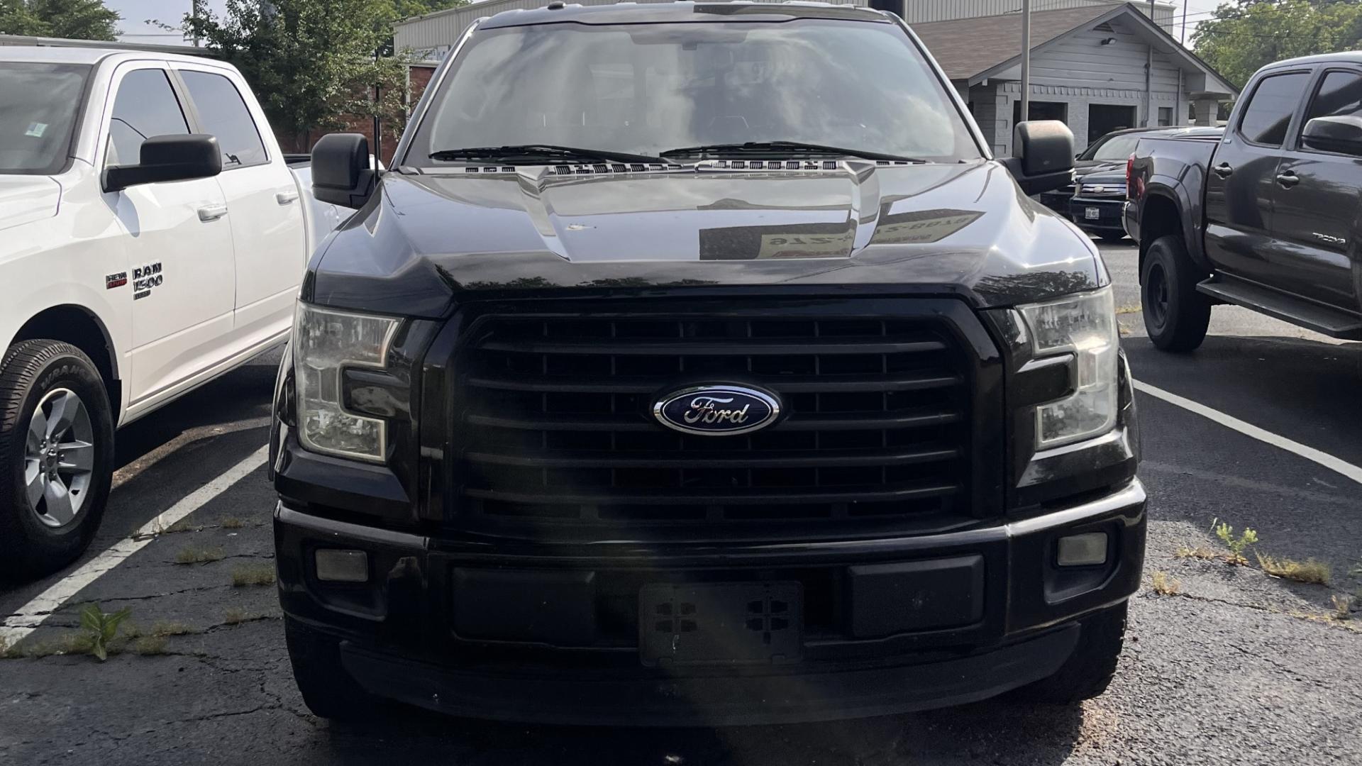 2015 Black Ford F-150 XLT SuperCrew 6.5-ft. Bed 4WD (1FTEW1EG3FK) with an 3.5L V6 TURBO engine, 6-Speed Automatic transmission, located at 945 E. Jefferson Blvd, Dallas, TX, 75203, (214) 943-7777, 32.752514, -96.811630 - Photo#0